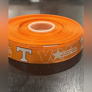 1 inch wide University of Tennessee Volunteers logo 100% polyester material VOLS